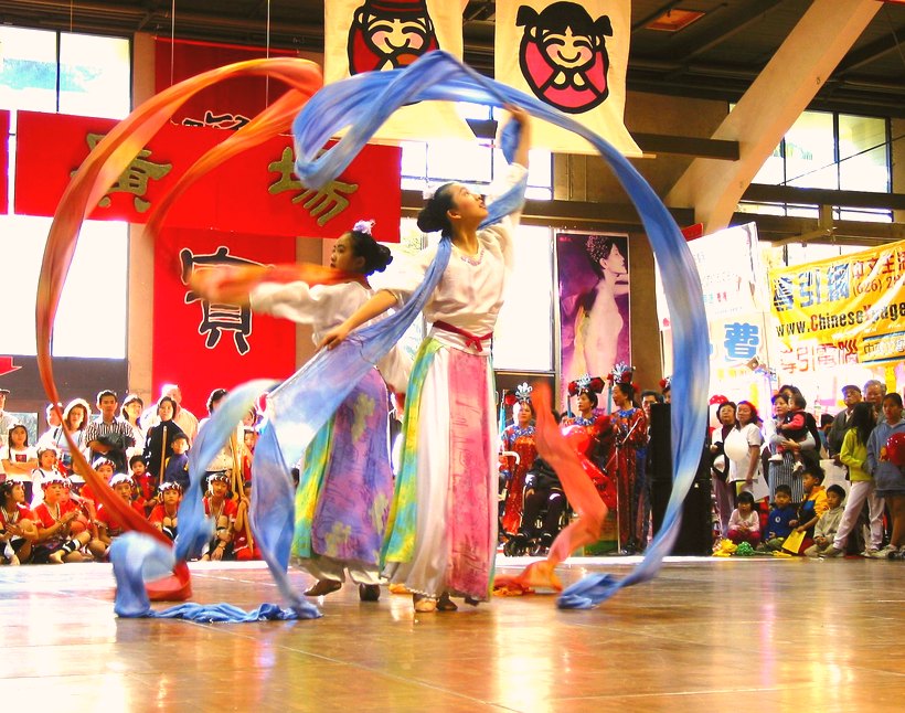 Ribbon dancers swirling silk streamers